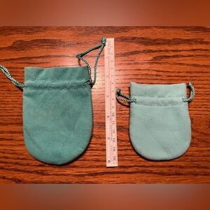 Aqua colored jewelry bags lot (4)